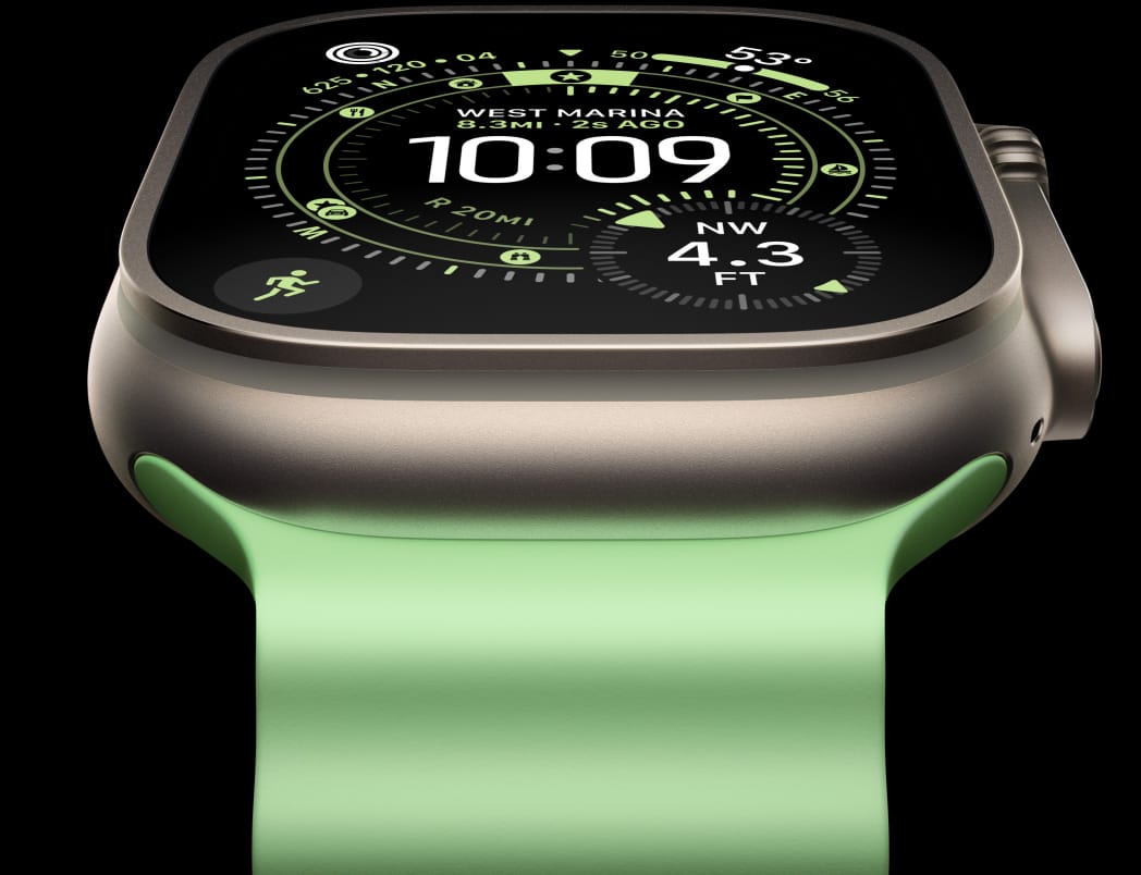Apple Watch Ultra 3, titanium case, natural colour, compass on Orienteering watch face, Ocean Band, neon green colour