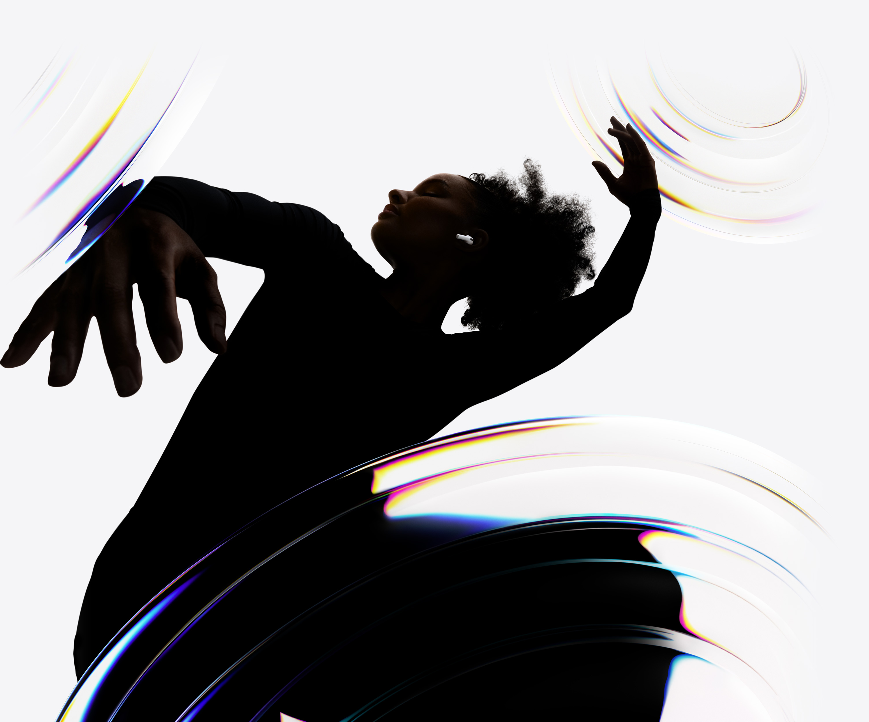 AirPods Pro 3 inserted in the ear of a dancer as they enjoy a hands-free listening experience