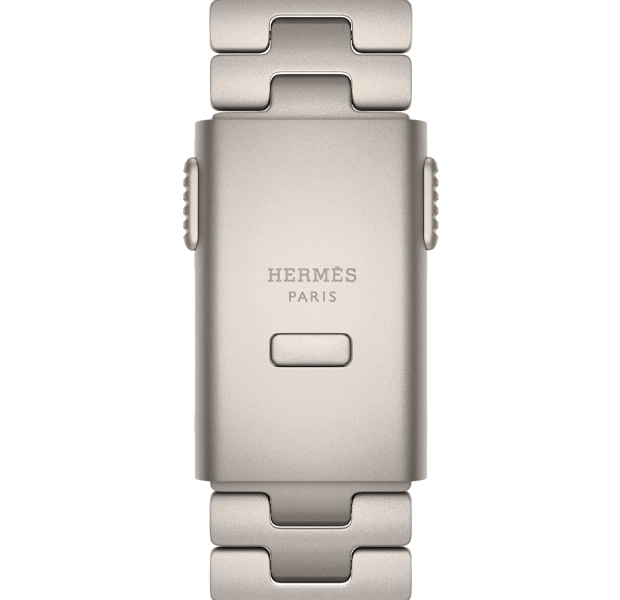Detalle de la correa Grand H Titane del Apple Watch Hermès Ultra 4, color Gris Titane, logo de Hermès grabado en la hebilla
