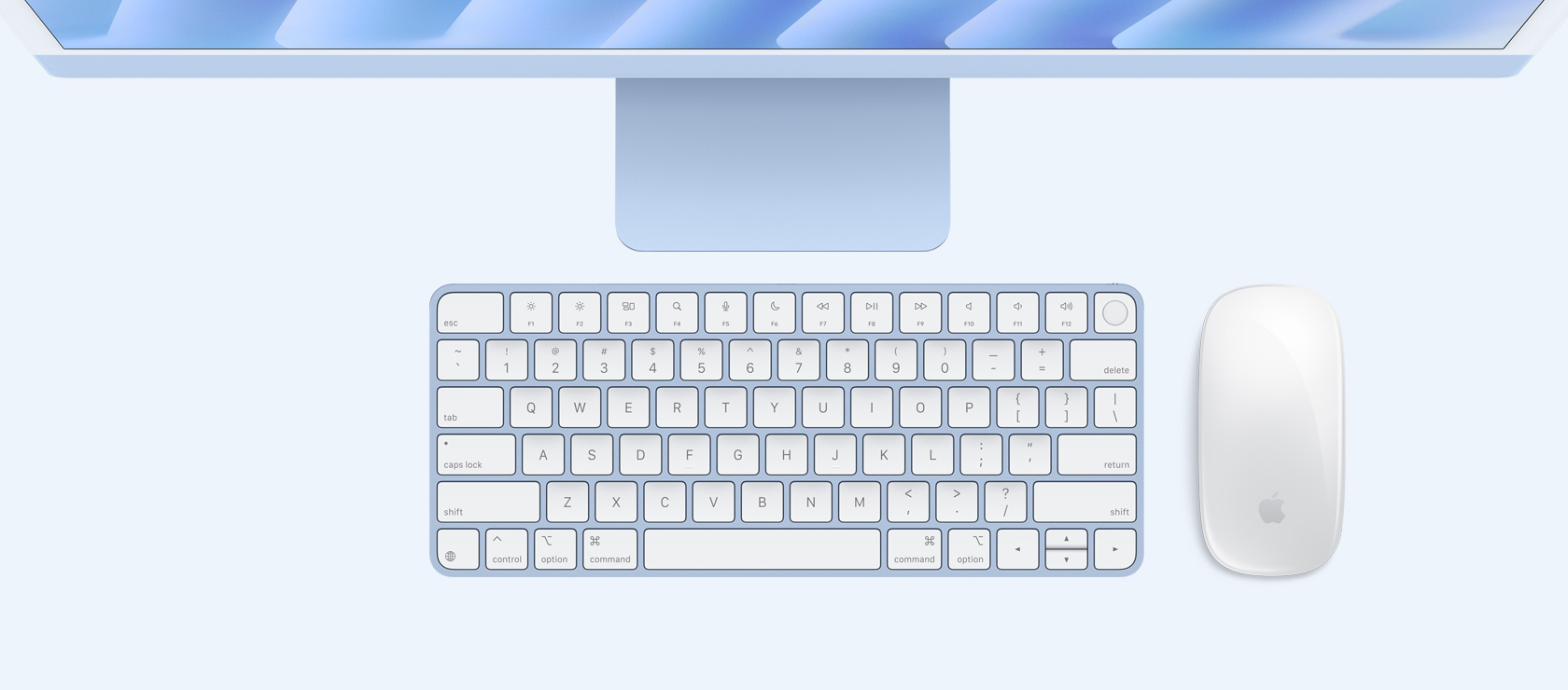 Sinine iMac ülalt alla vaates koos sama värvi hiire ja klaviatuuriga