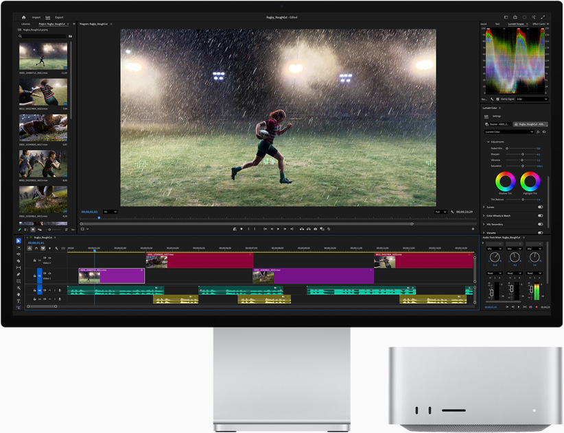 Studio Display XDR-skærm, der viser Adobe Premiere og et billede af en atlet, der løber i regnvejr på en sportsbane, samt Mac Studio vist forfra