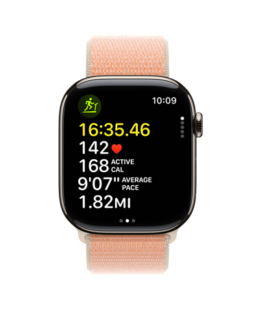 Apple Watch Series 11, Gold, with Workout app on screen showing running metrics including time, heart rate, active calories, average pace and distance